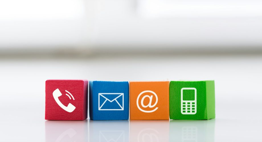 Contact us concept with colorful block symbol telephone, mail, address and mobile phone